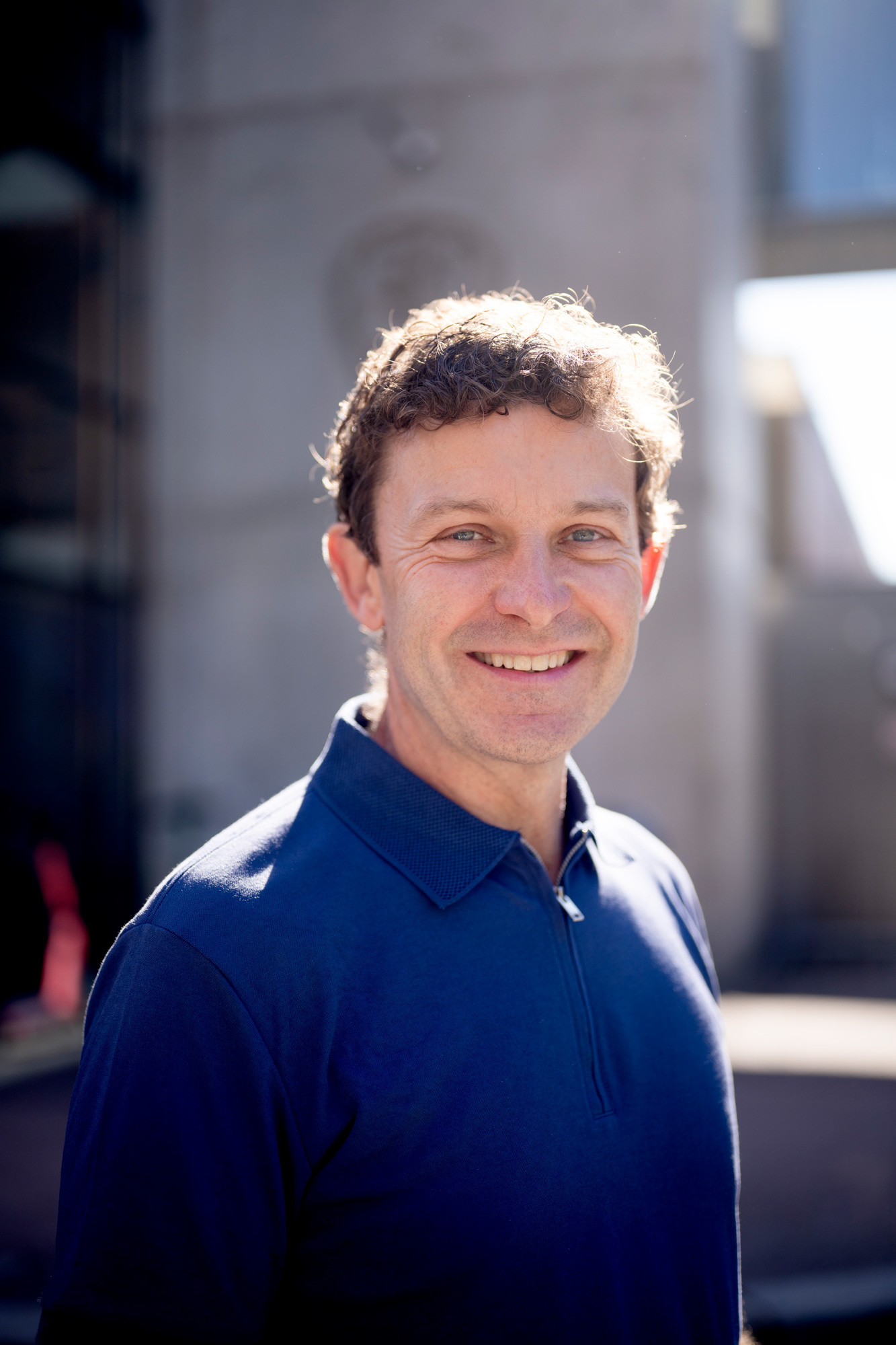 Portrett av en smilende Jon Helge Sætre.