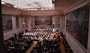 The orchestra performing at the celebration concert in the University Aula. Picture taken from above.